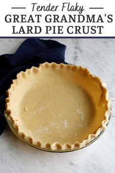 a pie crust in a pan with text overlay that reads tender flaky great grandma's hard pie crust