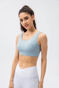 80% Nylon. 20% Spandex Soft. comfortable. skin friendly 4-way stretch. breathable and sweat-wicking Classic U-shape neckline Crisscross straps that offer intricate detailing to your look Featuring non-removable pads for built-in comfort and support Perfect for both sports activities and daily life