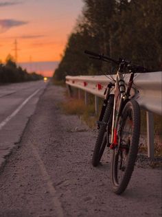 the bike is parked on the side of the road