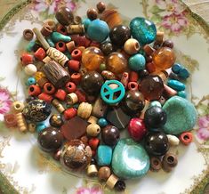 This is a lot of vintage and modern salvaged bohemian beads. Acrylic, wood, glass, cork etc. This is a mixed lot of all sizes that was salvaged from old necklaces and bracelets. There are quite a few larger beads in this lot that would make fabulous focal beads! You will receive 3/4 cups, all pictured. See pics Be sure to check out my other site for vintage jewelry and accessories! www.etsy.com/shop/thegypsyworepearls Brown Bohemian Beads For Crafting, Bohemian Brown Beads For Crafting, Turquoise Bead Jewelry, Focal Beads, Southwestern Jewelry, Modern Pendant, Wood Glass, Focal Bead, Bead Caps