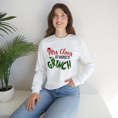 🎄 Get into the holiday spirit with our latest addition to our Etsy store! 🎉 We're excited to present a hilarious sweatshirt that's perfect for the women in your life or for yourself. If you find yourself married to the Grinch, then this is the ultimate must-have item for you.  Show off your love for Christmas while embracing your unique situation with our humorous sweatshirt. It's the ideal gift for anyone who adores the holiday season but finds themselves married to a Grinch-like character. Spread some laughter and cheer with the quote that proudly declares "Mrs. Claus, but Married to the Grinch." Don't let this opportunity slip away! Supplies are limited, and this sweatshirt is bound to be in high demand. Grab it now and make a bold fashion statement during the holiday season. It's the Ski Outfits For Women, Winter Shirts, Graphic Sweaters, Winter Mode, Men Sweatshirt, Holiday Sweatshirt, Winter Sweatshirt, Holiday Sweater, Baby Cold