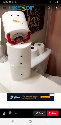 the toilet paper is stacked on top of each other