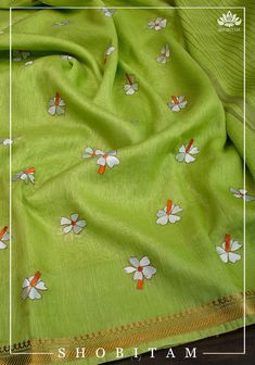 The sight of these flowers will take you to a nostalgic past! Paarijat - the eternal flower charms us with its heavenly fragrance and distinct orange stem! Presenting a vibrant Parrot green silk linen saree with Parijat- the eternal flower motifs embroidered on it.  The saree is ready to wear with falls and pico done. Look at those long tassels that dangle playfully from the pallu. An unstitched blouse fabric is included. Note: There may be slight color variations due to variation in screen sett Parijat Flower, Eternal Flower, Parrot Green, Flower Motifs, Linen Saree, Silk Linen, Green Silk, Blouse Fabric, Flower Charm