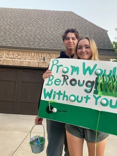 two people holding a sign that says from world be rough without you