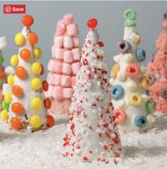 there are many small trees made out of marshmallows and candy canes