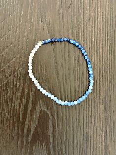 Blue ombre beaded bracelet, perfect for a boy mom new mom gift or mothers day, or anyone who loves blue!   would make a great gift for a blue color wedding party! On elastic string so one size fits most (7" standard). Everyday Blue Hand-strung Beaded Bracelets, Flexible Blue Beaded Bracelets, Blue Hand-strung Stretch Bracelet, Flexible Blue Stretch Bracelet As Gift, Blue Beaded Flexible Stretch Bracelet, Blue Beaded Stretch Bracelet, Adjustable Blue Friendship Bracelets With Faceted Beads, Flexible Blue Beaded Stretch Bracelet, Adjustable Blue Faceted Beads Friendship Bracelets