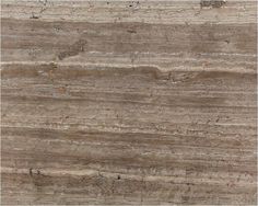 a close up view of the surface of a marble countertop with brown and tan tones