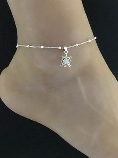 White Opal Butterfly AnkletMinimalist and Dainty Beaded Butterfly Ankle ChainANKLET FEATURES:Metal:  All components are made from solid .925 Sterling Silver Model is wearing 10" in length  solid .925 Sterling Silver Beaded ChainChain Length:  9 inch + 1 inch extension Your Dainty Butterfly Anklet will arrive in a gift box, beautifully wrapped and ready for giftingPlease send me a message if you have any questions before or after placing your order. *********************************************** Dainty White Wedding Anklets, White Ankle Strap Anklets As Gift, Adjustable Silver Ankle Strap Jewelry, Silver Beaded Ankle Wrap Anklet, Beaded Silver Ankle Wrap Anklet, Anklet Chain, Butterfly Anklet, Dainty Butterfly, Beaded Butterfly