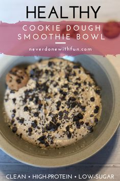 a bowl filled with cookies and cream on top of a table