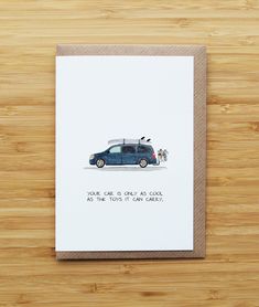 a card with an image of a blue car and the words love is in the air