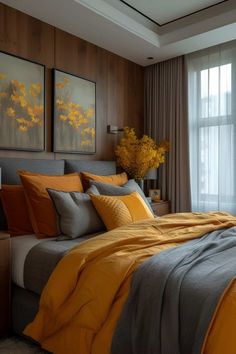 a bed with yellow and gray sheets in a bedroom