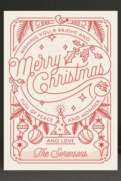 a christmas card with the words merry and love in red ink on white paper, surrounded by