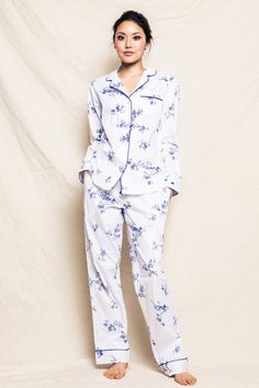 This gorgeous floral pajama set is perfectly on-trend accented with navy piping and finished with pearl buttons.  The fabric is made from 100% of the finest quality cotton and brushed for added softness making the sleepwear feel absolutely luxurious, getting cozier after each wash. You will be tucked in luxury and off Floral Pajama Set, Luxury Sleepwear, Indigo Floral, Classic Pajamas, Floral Pajamas, Womens Pyjama Sets, Floral White, Night Shirt, Pearl Buttons