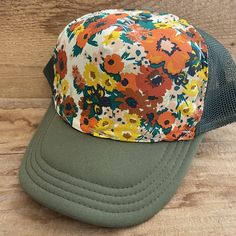 Vintage Floral Fabric bringing back the best looks.   All hats have a terry cloth lining, mesh back, and snap adjustable back. We believe in individual expression,  hand crafting, and getting outside.  Our hats are meant to instill adventure in you whenever you wear them!   Stitching is random.  If you desire a certain color (or don't want a certain color) please write in notes.  All our hats are hand stitched by us, local women,  or our team of lady stay at home mom seamstresses in L.A.  Every hat is unique as they are not mass produced.  We buy our fabrics from small fabric designers or work closely with artists or textile makers. Some fabric is custom made through working directly with artists and made in limited batches.  Customers come back again and again as our hats are comfortable, Summer Baseball Cap, One Size Fits Most For Outdoor, Summer Baseball Cap For Outdoor, One Size Fits Most, Summer Baseball Cap For Outdoor, Summer Lightweight Visor Trucker Hat, Lightweight Summer Trucker Hat With Visor, Summer Trucker Hat For Outdoor, Lightweight Visor Trucker Hat For Beach, Lightweight Trucker Hat Visor For Summer, Lightweight Visor Trucker Hat For Summer