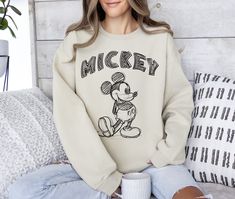 Mickey Mouse Sweatshirt, Mickey Sweatshirt, Mickey Mouse Sweater, Mickey Mouse Hoodie, Mickey Sweatshirt, Mickey Mouse Gift, Mickey Sweater How can I order? 1️) Please review all the information provided before placing an order 2️) Select the shirt type and size. 3️) Select the color of the shirt using the following options. 4️) Need more Items? Add the current item in the cart. And If you like to add more items to your order please press the back button and repeat steps 1-4 again. 5️) Once all Mickey And Co Sweatshirt, Cute Mickey Mouse Cotton Sweatshirt, Mickey Mouse Sweatshirt For Winter Streetwear, Disney Jumper, Disney Mickey Mouse Sweatshirt, Mickey Mouse Sweater, Mickey Mouse Crew Neck Hoodie For Streetwear, Mickey Mouse Hoodie, Mickey Mouse Gifts