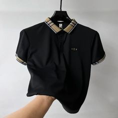 The Handcrafted Barante polo shirt is a handcrafted masterpiece designed for those who appreciate quality, comfort, and style. Made from a premium blend of cotton, polyester, and lyocell, this shirt is not only extremely soft but also designed to last for years. Its versatile design makes it easy to style with any outfit, ensuring you always look your best. Features Handmade to Perfection: Each shirt is meticulously crafted to ensure the highest quality and durability. Designed to Last for Years Luxury Black Polo Shirt With Short Sleeves, Luxury Black Short Sleeve Polo Shirt, Fitted Short Sleeve Luxury Polo Shirt, Luxury Fitted Short Sleeve Polo Shirt, Luxury Fitted Polo Shirt With Collared Neckline, Luxury Fitted Polo Shirt, Short Pj Set, Sleeveless Long Dress, Summer Swim Suits