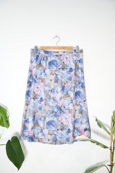 Vintage skirt with beautiful blue and pink floral pattern throughout. It has button and zip fastening as well as inside lining. No size or care label Lovely Condition  Recommend to fit U.K. 14 Measurements: Length - 27inch Waist - 32inch Hips - 38inch Please note that returns are accepted however you will lose your delivery cost. Return costs are also the responsibility of the customer.  Please feel free to message with any questions! Thanks 😊 Relaxed Floral Print Skirt For Daywear, Floral Print Relaxed Fit Skirt For Daywear, Pink Floral Print Skirt For Daywear, Daywear Floral Print Skirt, Blue Floral Print Relaxed Skirt, Blue Floral Print Relaxed Fit Skirt, Pink Floral Pattern, Patterned Cardigans, Vintage Cardigan