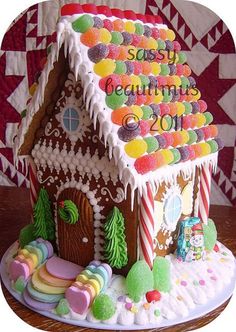 a gingerbread house decorated with candy and candies