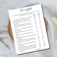 a printable time off list on a wooden plate next to dried flowers and cotton swab