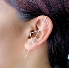 These striking Sterling Silver ear cuffs take earring design to another dimension. Handcrafted, the double kite design has a great geometric profile, and we offer two lengths  to suit different ear sizes, as well as offering this style as a single earring or as a pair. The ear pin also comes in Sterling Silver, 18kt Gold or Rose Gold plated, or in a gunmetal finish oxidized Sterling Silver. A great earrings style for those looking for unusual or unique earrings. Made from: Sterling silver. Measu Third Piercing, Ear Pins Earrings, Double Triangle, Silver Ear Climbers, Edgy Earrings, Ring Man, Ear Climbers Earrings, Ear Climber, Ear Pins