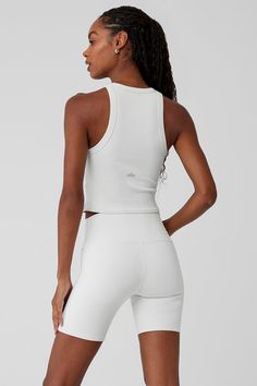 The name says it all: The Goddess Ribbed Go-To Tank fits like your best basic tank, with a racerback and cropped hem—but it’s made from a buttery-soft, ribbed performance fabric that’s perfect for practice. Layer it over a sports bra for movement, then pair it with trousers for an effortless street-style look. Ribbed Racerback Crop Top, Sporty Ribbed Cropped Tank Top, Ribbed Racerback Athleisure Crop Top, Athleisure Ribbed Crop Tank Top, Alo Yoga Ribbed Athleisure Top, Ribbed Racerback Crop Top For Workout, Spring Compressive Ribbed Activewear, Medium Support Athleisure Crop Top For Everyday, Everyday Athleisure Crop Top With Seamless Construction