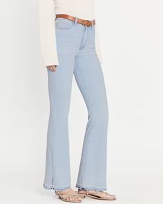 Frame Le Easy Flare Fray Hem Slit Jean in Clarity High rise Button closure Zip fly Belt loops Five pocket style Straight silhouette Full length Raw hem Stretch denim fabrication 77% cotton, 18.5% modal, 3.5% elasterell-p, 1% elastane Evening Jumpsuit, Cold Fits, Hemant And Nandita, Summer Icon, Cami Nyc, Bodysuit Dress, Cami Crop Top, Casual Blazer, Denim Flares