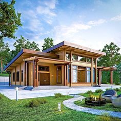 a small wooden house sitting on top of a lush green field