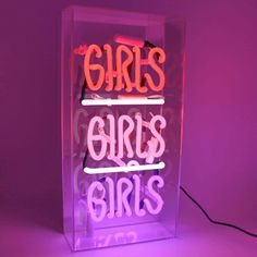 a neon sign with the words girls are girls on it in front of a purple background