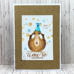 a card with a guinea pig wearing a party hat