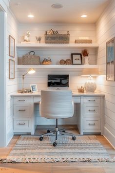 a home office with white walls and shelves