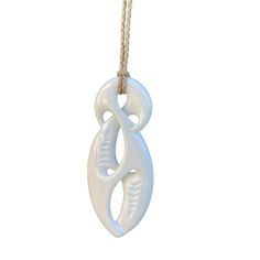 Handmade Maori Unity Twist pendant with with engraved carvings. This Twist has a modern style blending elements from the Hai-Matau and the Koru which represent prosperity, new life and peace. The Twist with its crossing design represents the many paths of life and love, as such is regarded as the original eternity symbol. A single Twist shows the joining together of two people for eternity while the double and triple twists have a similar meaning but refer more to the joining of two peoples or c Traditional White Carved Necklaces, Artisan Carved White Necklace, White Carved Pendant Necklaces, White Carved Pendant Necklace, White Carved Amulet Necklace, White Symbolic Pendant Necklace, Artisan White Engraved Necklace, Eternity Symbol, Single Twist