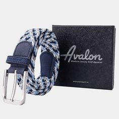 a blue and white braided belt next to a black box with the word abalon on it