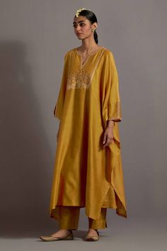 Mustard yellow kaftan with phool guccha and three phool booti embroidered in zari, zardozi and sequins on yoke. Comes with straight pant. - Aza Fashions Yoke Kurti Designs, Yellow Raw Silk Kurta With Dabka Detailing, Yellow Raw Silk Kurta With Dabka, Yellow Dabka Raw Silk Kurta, Mustard Resham Embroidery Kurta For Eid, Traditional Gold Kaftan For Diwali, Traditional Gold Tunic Kurta, Gold Anarkali Kaftan With Zari Work, Anarkali Gold Kaftan With Dabka Work