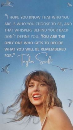 a woman with long hair standing in front of seagulls and the words taylor swift above her