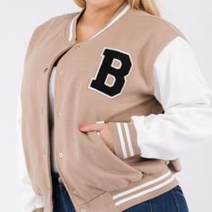 Varsity Jacket Cream Long Sleeve Varsity Jacket For Fall, Cream Outerwear For College In Fall, Fall Cream Outerwear For College, Cream Fall Outerwear For College, Brown Fitted Varsity Jacket With Long Sleeves, Classic Brown Long Sleeve Varsity Jacket, Brown Varsity Long Sleeve Outerwear, Brown Varsity Jacket With Letter Print, College Long Sleeve Varsity Jacket With Double-lined Hood