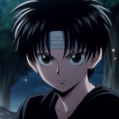 an anime character with black hair and blue eyes looking at the camera in front of trees