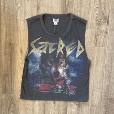 Size Large. 70% Cotton, 30% Polyester. New With Tags. Graphic Baby Tees Red Cotton Grunge Top, Casual Red Tank Top With Graphic Print, Red Edgy Tops With Letter Print, Red Letter Print Edgy Tops, Edgy Red Tops With Letter Print, Red Grunge Tops For Streetwear, Edgy Red Summer Tops, Edgy Red Summer Top, Red Cotton Edgy Tops