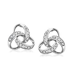 Ross-Simons - .10 ct. t. w. Diamond Celtic Knot Stud Earrings in Sterling Silver. It's always the right time to embrace your Irish side (even if you don't have one!) Our traditional Celtic knot stud earrings are a perfect everyday staple, glimmering with .10 ct. t. w. round diamonds in sterling silver. Post/clutch, diamond Celtic knot stud earrings. Diamond birthstones are the perfect gift for April birthdays. Classic Sterling Silver Diamond Earrings With Round Stone, Diamond Cluster Earrings Celtic, Sterling Silver Single Diamond Round-cut Earrings, Knot Stud Earrings 1stdibs, Celtic Earrings Studs, Knot Stud Earrings, April Birthday, Knot Studs, Diamond Birthstone