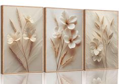 three panels with flowers and leaves on them in beige tones, each panel is mounted to the wall