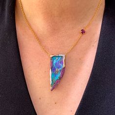 "Exquisite in every way, this Boulder Opal necklace has Pave pink Sapphires and pave diamonds, in black rhodium. Wrapped in 14 karat rose gold with a matching cable chain necklace. The necklace has an oval garnet offset in a prong setting an inch and half from the Opal. This pendant is from our \"Opalescence\" Collection. Each stone is very unique in shape, size color and quality. Although viewed differently by each individual, this stone embodies the beautiful hues of the natural ocean surround Luxury Artisan Opal Necklaces, Black Opal Jewelry, Boulder Opal Necklace, Australian Opal Pendant, Opal Pendant Necklace, Necklace Rose Gold, Australian Boulder Opal, Necklace Rose, Black Rhodium