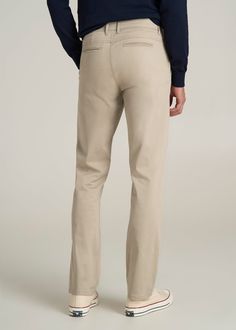 About Our Tall Chinos Stylish, comfortable and built for your frame. These men's tall pants will become your new go-to pair for any occasion. As a tall guy, you're used to having limited options when it comes to chinos, with inseams that are too short and styles that fit in all the wrong places. Chinos are meant to provide a polished look but as a tall guy, you're often stuck with a look that's more awkward than put-together. We're changing the game when it comes to pants for tall men. These chi Scrubs Dress, Cozy Sleepwear, Chino Pants Men, Tall Men, Tall Pants, Fall Denim, Sports Blazer, Long Sleeve Tee Shirts, Suit Shop