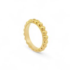 Embrace timeless elegance with this beautifully crafted Bubble Ring, a piece that epitomizes sophistication and style. The unique scalloped design offers a contemporary twist on classic luxury, making it the perfect accessory for those who appreciate fine craftsmanship. Width - 3.8mm Size - 5-12 Weight (approximate): 7-9.5grams Material: 14K Gold Elegant Stackable Dome Ring As Gift, Elegant 14k Gold Jewelry With Fluted Bezel, Adjustable Elegant Yellow Gold Dome Ring, Elegant Adjustable Open Band Dome Ring, Elegant Stackable Rings With Round Band, Elegant Adjustable Dome Ring For Anniversary, Elegant Wedding Watch With Fluted Bezel, Elegant Wedding Jewelry With Fluted Bezel, Jewelry With Fluted Bezel For Gift