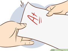 two hands holding up a piece of paper with chinese characters on it