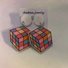 Rubix Cube Earrings Nwt Trendy White Drop Clip-on Earrings, Retro White Dangle Earrings, Retro White Earrings For Gift, Retro White Drop Earrings, Retro White Dangle Jewelry, Modern White Clip-on Earrings For Gift, Retro White Clip-on Earrings As Gift, White Retro Clip-on Earrings As Gift, Retro Geometric Jewelry Gift