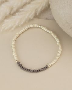 "Buy individually or 'Shop the Stack'. 🌴  buy 2 or more | use Coupon Code STACK for 25% off your purchase! 🌴  buy 5 or more | use Coupon Code STACKMORE for 30% off your purchase! Cool beige and grey beaded bracelet or anklet. These beautiful bracelets and anklets are hand-strung on high-quality stretch cord in your choice of length. A beautiful pop of color to wear on its own or layered with your favorite jewelry. Buy just one or select our 'SHOP THE STACK'. SHOP THE STACK' includes the 6 pieces as shown in \"Shop the stack\" image at a discounted price ------------------------------- 💕 WHY YOU'LL LOVE IT *Nickel-free for sensitive skin *Customize your size for the perfect fit *Ships next day with FREE US shipping  *Ready-to-gift *HAPPINESS GUARANTEE: we want you to LOVE your new jewelr Cream Bracelets As Summer Gift, Cream Bracelets For Summer Gift, Adjustable Cream Bracelet For Summer, Minimalist Beaded Bracelets For Beach In Summer, Adjustable Cream Bracelets For Summer, Minimalist Beaded Bracelets For Summer Beach, Minimalist Beaded Bracelets For Beach Summer, Cream Round Beads Bracelets For Beach, Cream Bracelets With Round Beads For Beach