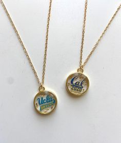 "Show off your school spirit and rep your school with pride with our College Collection necklaces! Ready to take your college gameday fits to the next level and stand out from the crowd? These unique and eye-catching necklaces are different from anything else you'll find in the college merch market. They are perfect for celebrating a college acceptance/commitment or graduation, as well as for all college students, sports fans, alumni, and much more! I can also make this necklace with the logos o College Gifts For Friends, Graduation Basket Ideas, Gameday Fits, College Merch, College Grad Gifts, College Jewelry, College Acceptance, College Gameday, Logo Necklace