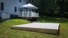 a house with a covered deck in front of it