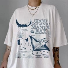 Manta Ray Anatomy T shirt, Giant Oceanic Manta Ray Shirt, Marine Biology T Shirt, Biologist Gifts, Christmas Gift, Sailing T Shirt 🎉 HOW TO ORDER: 1. Select the shirt 𝗦𝘁𝘆𝗹𝗲 2. Select the 𝗦𝗶𝘇𝗲 3. Select the shirt color 4. Select the quantity, 5. Click 𝗔𝗗𝗗 𝗧𝗢 𝗖𝗔𝗥𝗧. If you want to buy more than one, please go back to the listing and repeat the steps. - If you have any questions, please send us a message. 🎉 Product details: - Relaxed fit, size up for an oversized look. - Color may vary due to lighting or monitor settings. - Sizing has a tolerance of + or - 1 inch. 🎉 Highlighted features: - Versatile and fits all body shapes. - High-quality cotton fabric for comfort. - No excess threads on the product. 🎉 Care instructions: - Wash inside out in cold/warm water, delicate cyc Marine Biology Gifts, Oceanic Manta Ray, Tshirt Inspiration, Big 5, Manta Ray, Marine Biology, Character Ideas, School Shirts, Gifts Christmas