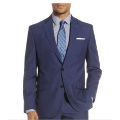 Jacket Has Four-Button Cuffs; Chest Pocket With Pocket Square; Front Flap Pockets; Side Vents Classic Royal Blue Blazer With Suit Collar, Semi-formal Blue Outerwear With Button Cuffs, Blue Semi-formal Outerwear With Button Cuffs, Tailored Blue Outerwear With Button Cuffs, Business Blazer With Suit Collar In Royal Blue, Royal Blue Business Blazer With Suit Collar, Classic Royal Blue Blazer For Workwear, Blue Blazer With Button Cuffs For Office, Professional Blue Outerwear With Suit Collar