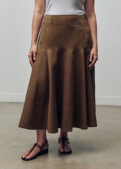 Fitted A-line Brown Maxi Skirt, Brown A-line Skirt For Summer, Casual A-line Maxi Skirt For Work, Chic Brown A-line Bottoms, Brown Midi Skirt For Summer, Brown A-line Skirt For Spring, Spring Stretch Brown Skirt, Spring Brown A-line Skirt, Brown Relaxed Maxi Skirt For Work